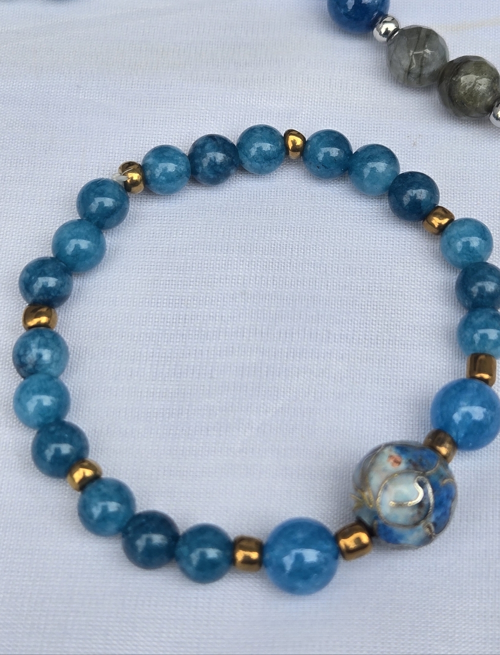 Blue Apatite Bracelet | Cloisonné Floral Center | Gold Spacers